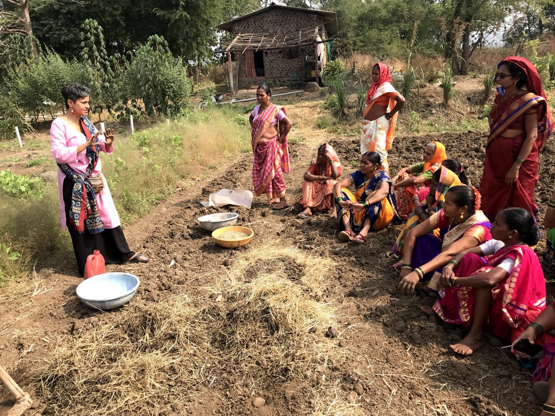 Komal teaching a kitchen garden workshop with women farmers in Palghar